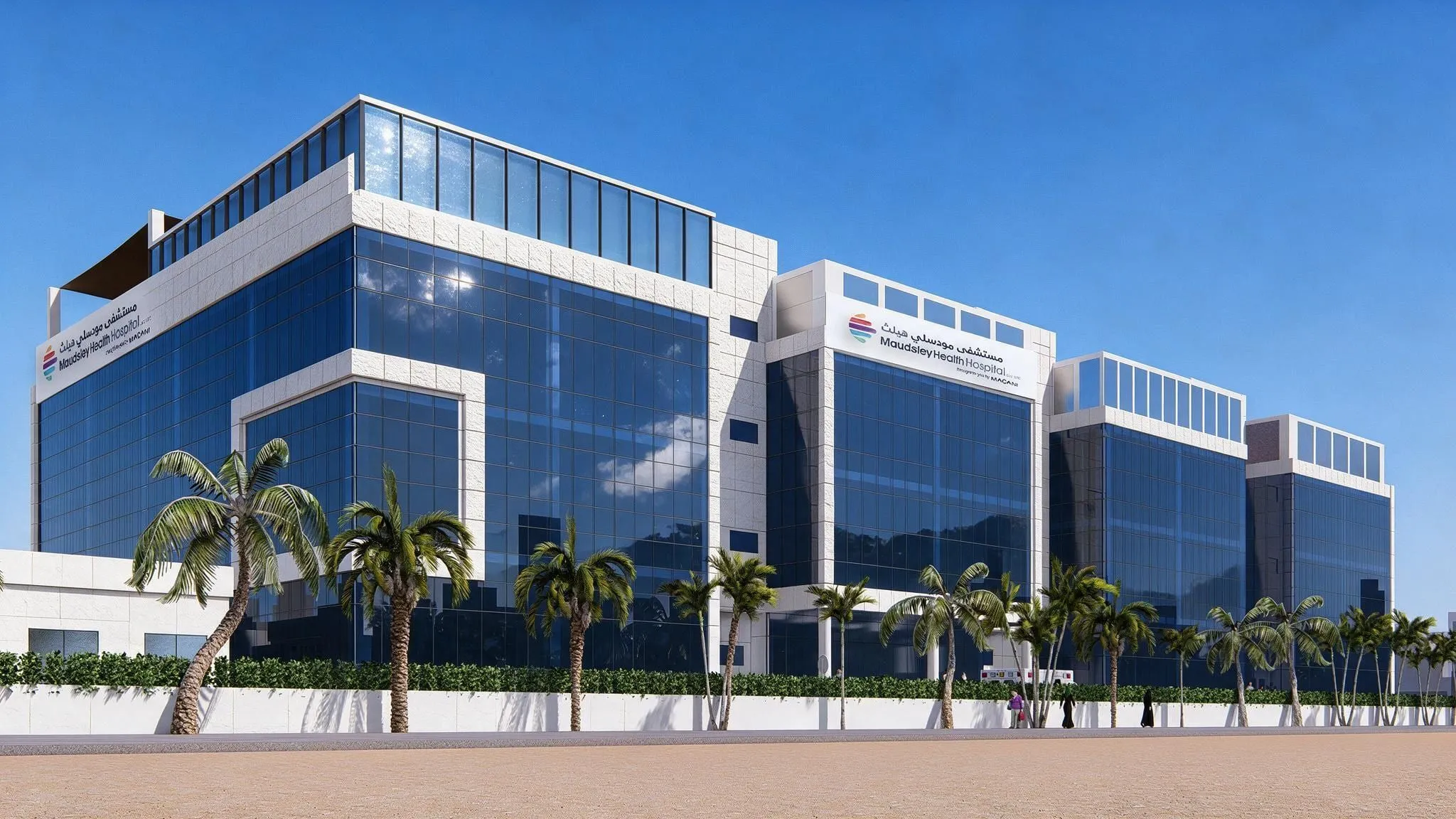 Architect’s render of Maudsley Health Hospital: a glass-fronted building signed “Maudsley Health Hospital” in English and Arabic, with palm trees along its white boundary wall